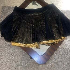 Black and gold skort - sports illustrated